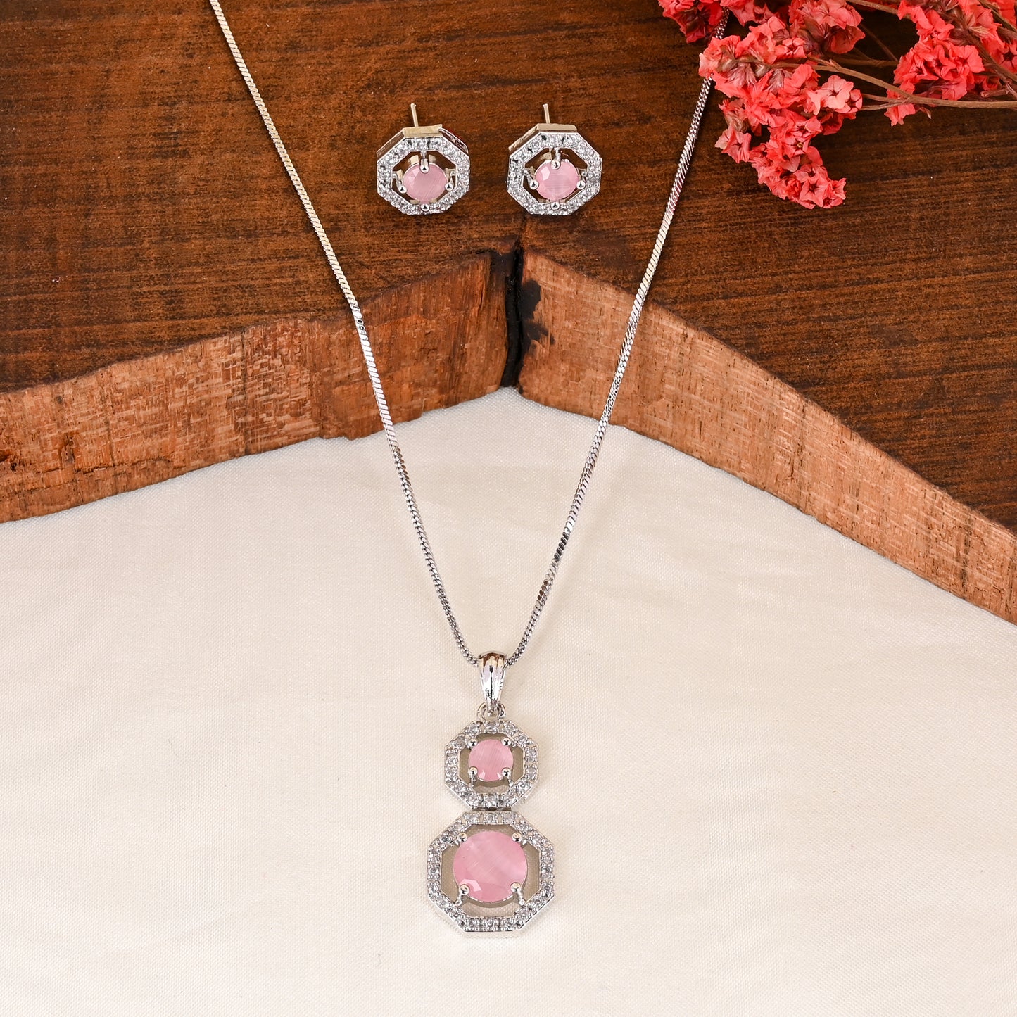 CKLAKART's NOOR Silver-Toned Chain Pendant Set Adorned with Pink Stones and Dazzling American Diamonds