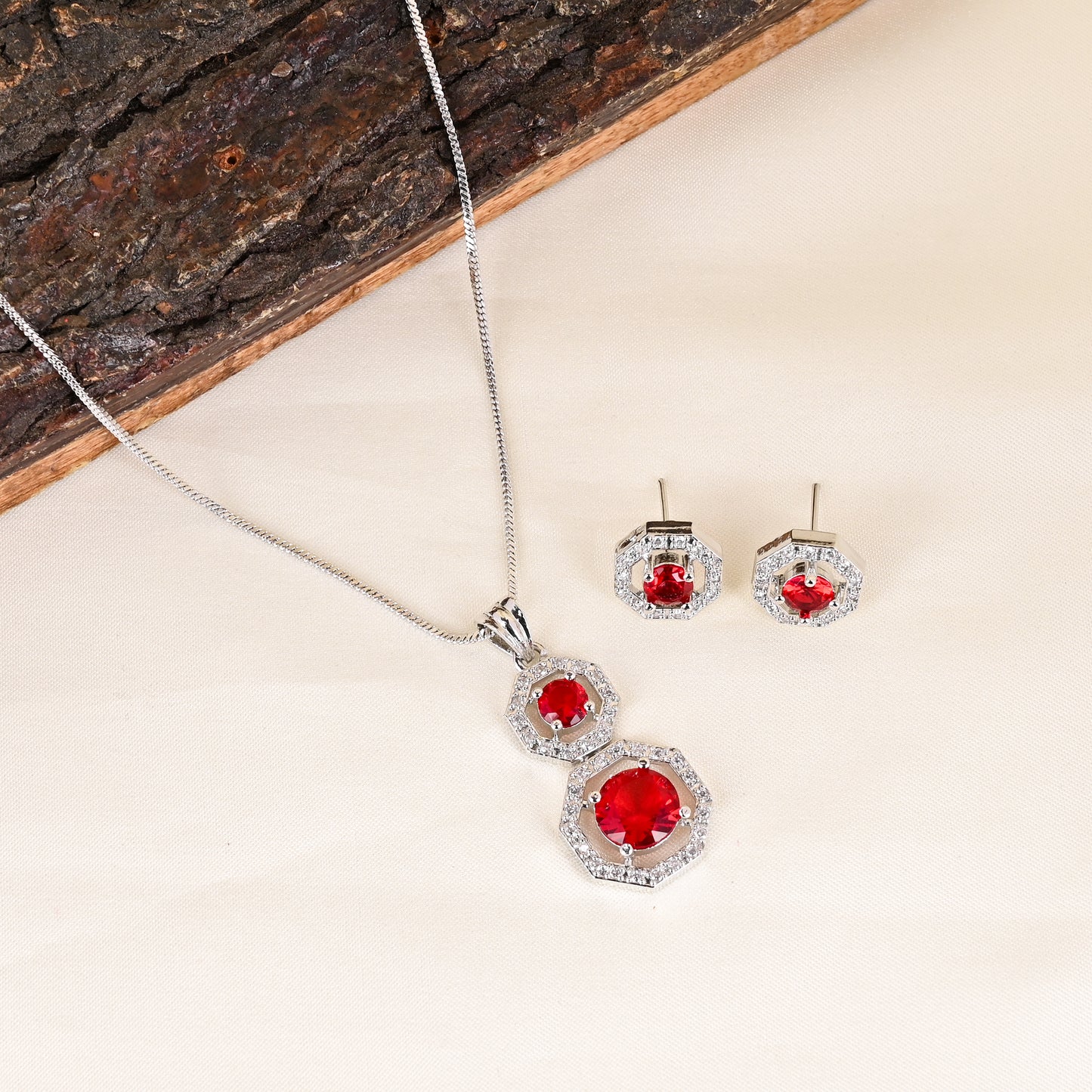 CKLAKART's NOOR Silver-Toned Chain Pendant Set Adorned with Ruby Red Stones and Dazzling American Diamonds