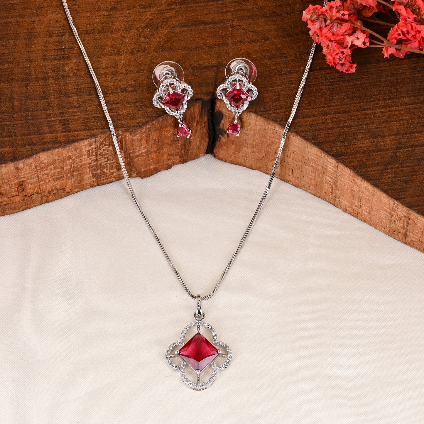 CKLAKART's NOOR Silver-Toned Chain Pendant Set Adorned with Ruby Red Stones and Dazzling American Diamonds