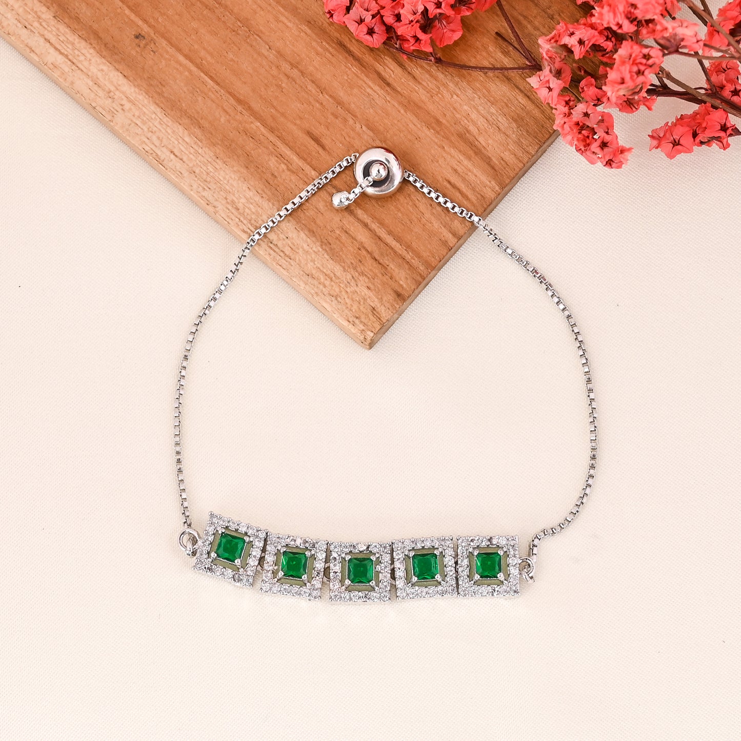 CKLAKART's NOOR Classic Silver-Toned Bracelet and Ring Set with Emerald Green Stones and Sophisticated American Diamonds