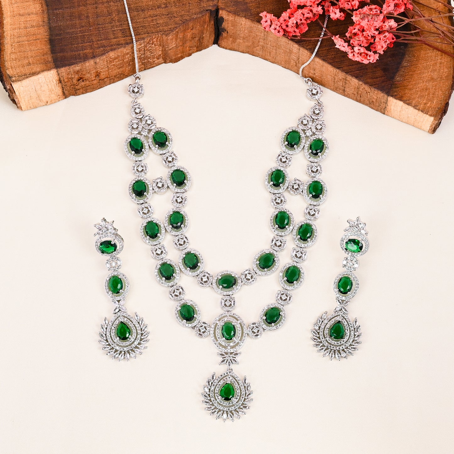 CKLAKART's NOOR Silver Double-Layer Necklace Set Featuring Emerald Green Stones and Sparkling American Diamonds