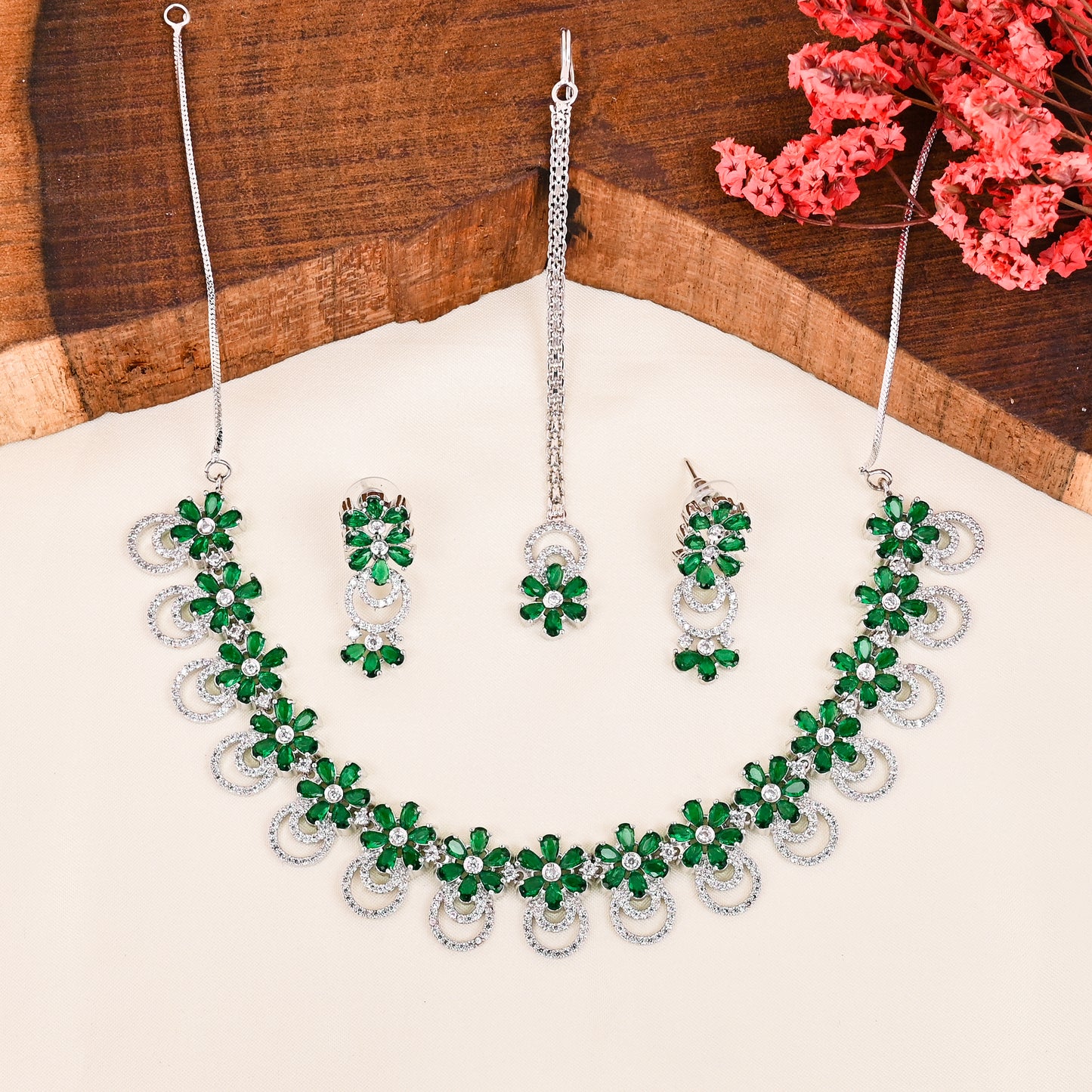 CKLAKART's NOOR Silver-Toned Choker set with Maang Tika Adorned with Emerald Green Stones and Dazzling American Diamonds