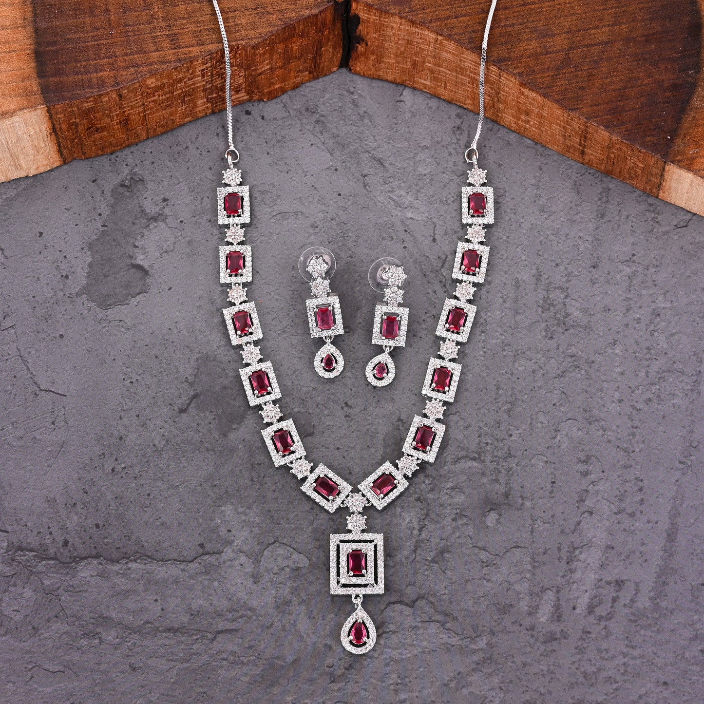 CKLAKART's NOOR Classic Silver-Toned Necklace Set with Ruby Red Stones and Sophisticated American Diamonds