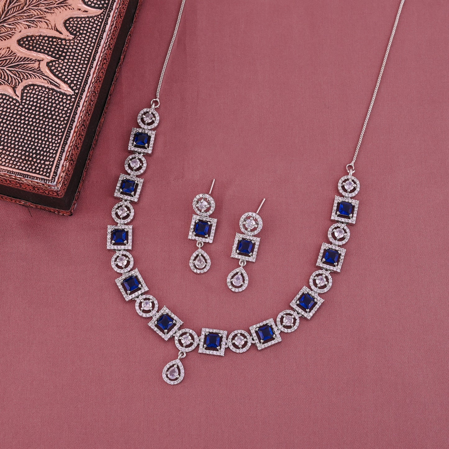 CKLAKART's NOOR Silver-Toned Necklace Set Adorned with Sapphire Blue Color Stones and American Diamonds