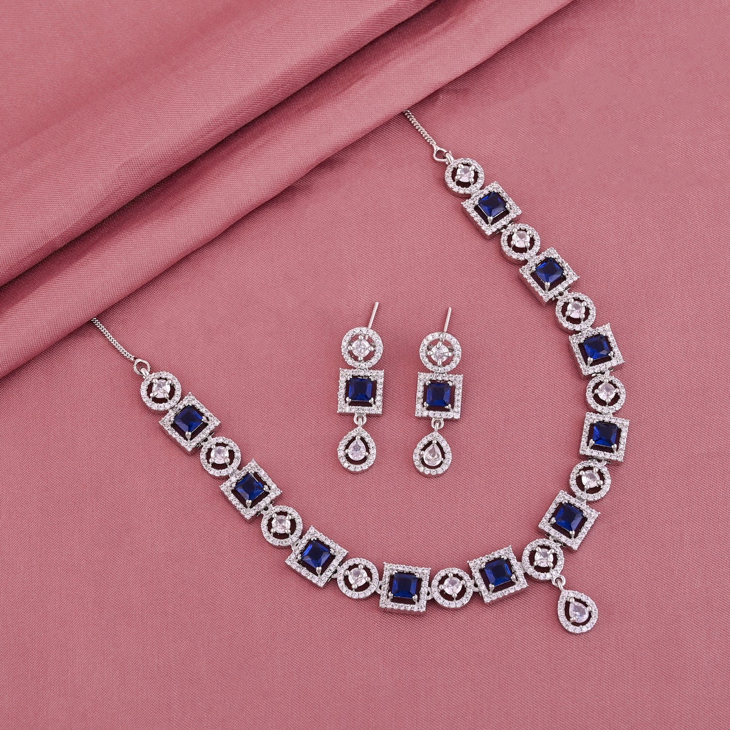 CKLAKART's NOOR Silver-Toned Necklace Set Adorned with Sapphire Blue Color Stones and American Diamonds