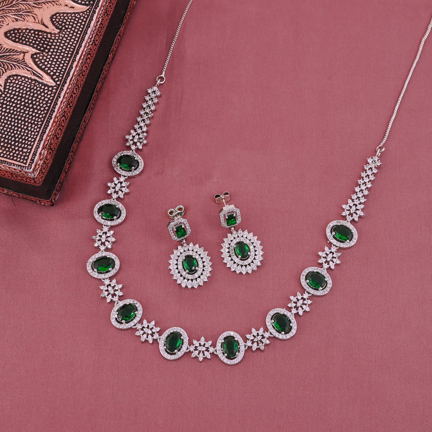 CKLAKART's NOOR Silver-Toned Necklace Set Adorned with Emerald Green Color Stones and American Diamonds