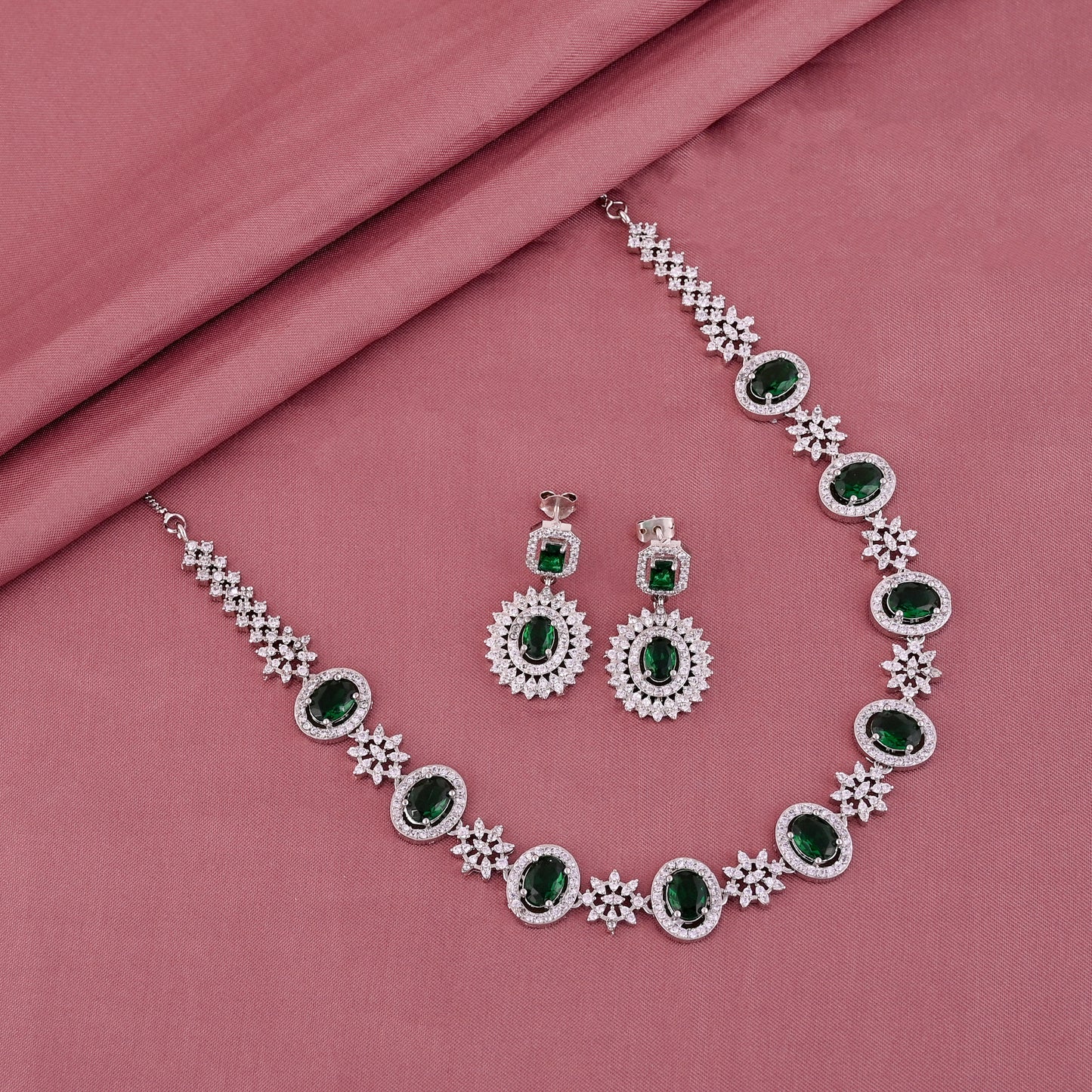 CKLAKART's NOOR Silver-Toned Necklace Set Adorned with Emerald Green Color Stones and American Diamonds