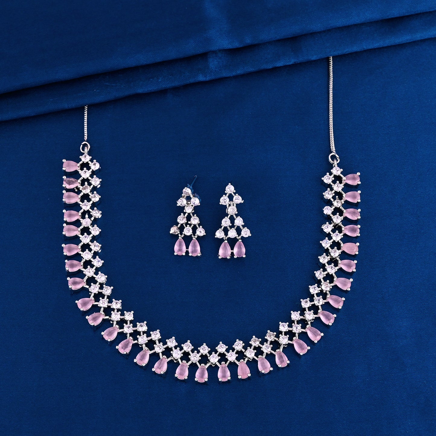 CKLAKART's NOOR Silver-Toned Choker Set Adorned with Pink Color Stones and American Diamonds