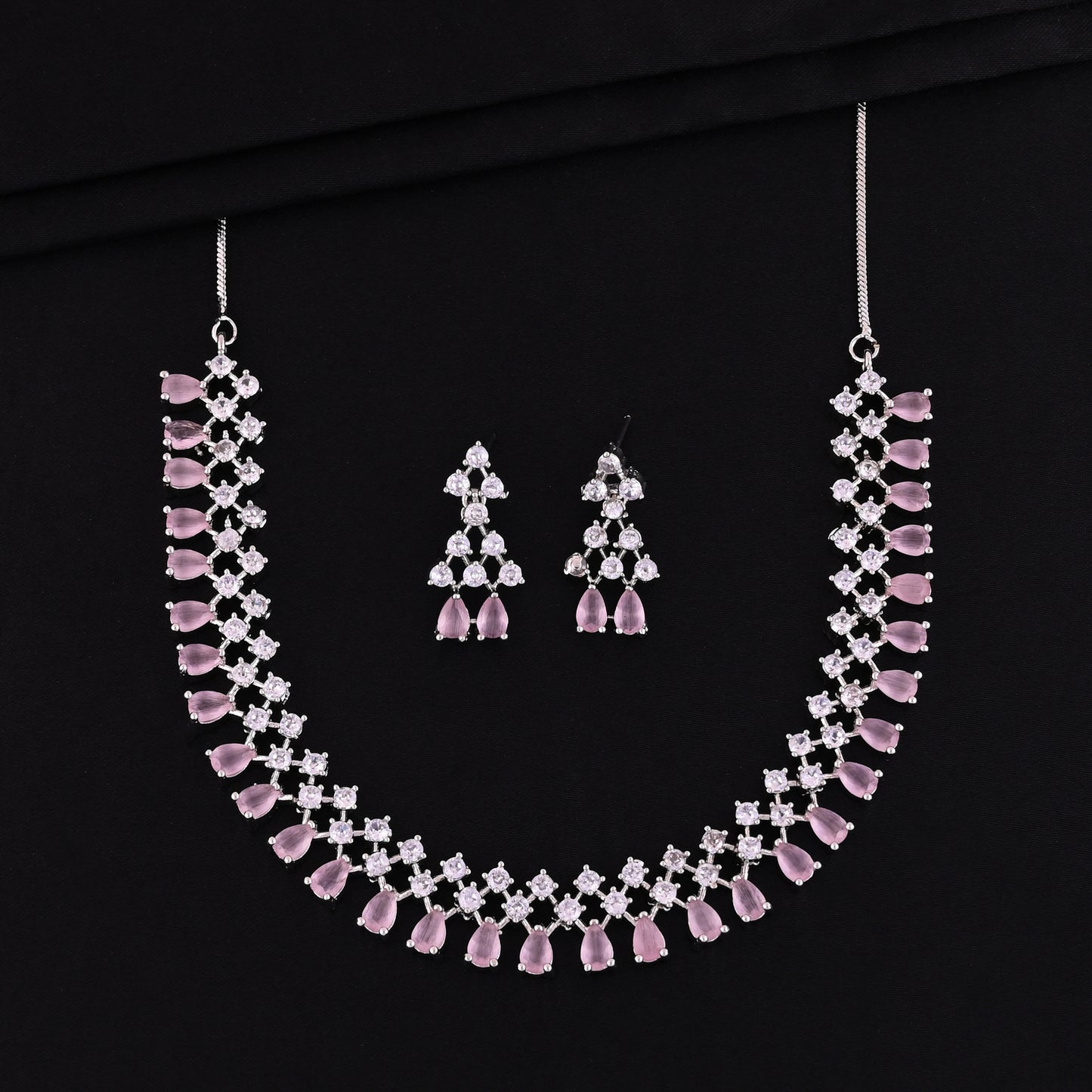 CKLAKART's NOOR Silver-Toned Choker Set Adorned with Pink Color Stones and American Diamonds