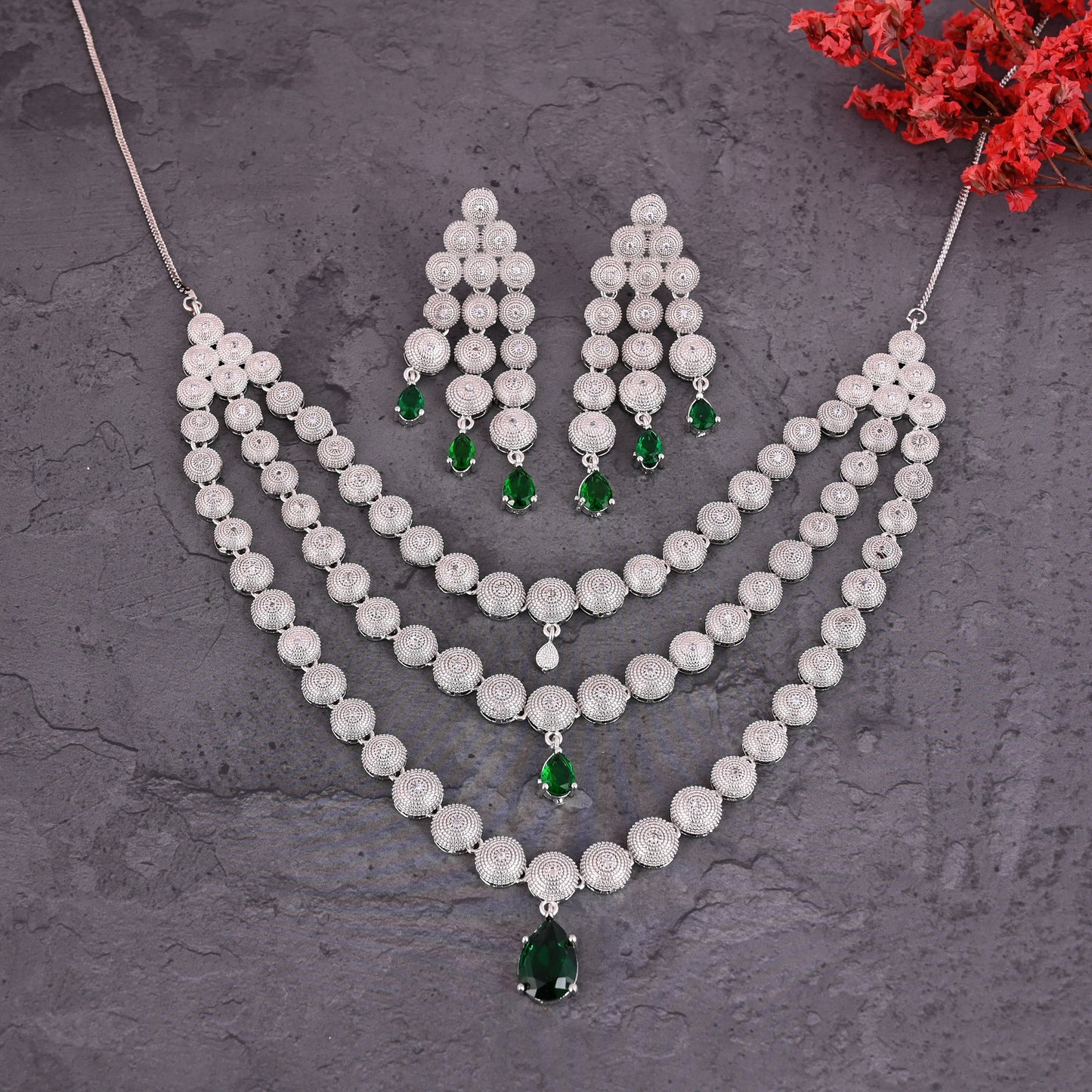 CKLAKART's NOOR Silver-Toned Triple-Layered Necklace Set Adorned with Emerald Green Stones and American Diamonds