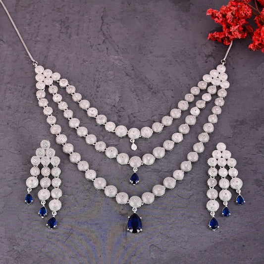 CKLAKART's NOOR Silver-Toned Triple-Layered Necklace Set Adorned with Sapphire Blue Stones and American Diamonds