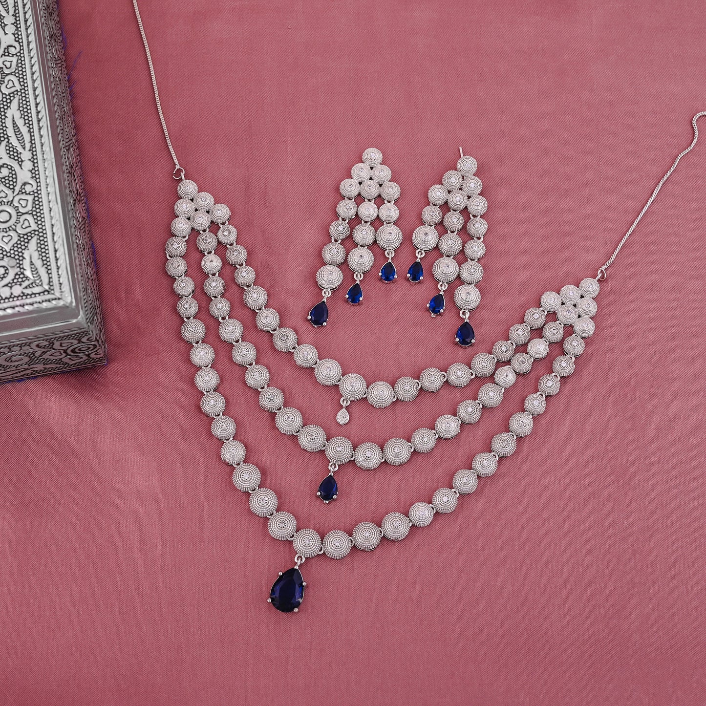 CKLAKART's NOOR Silver-Toned Triple-Layered Necklace Set Adorned with Sapphire Blue Stones and American Diamonds