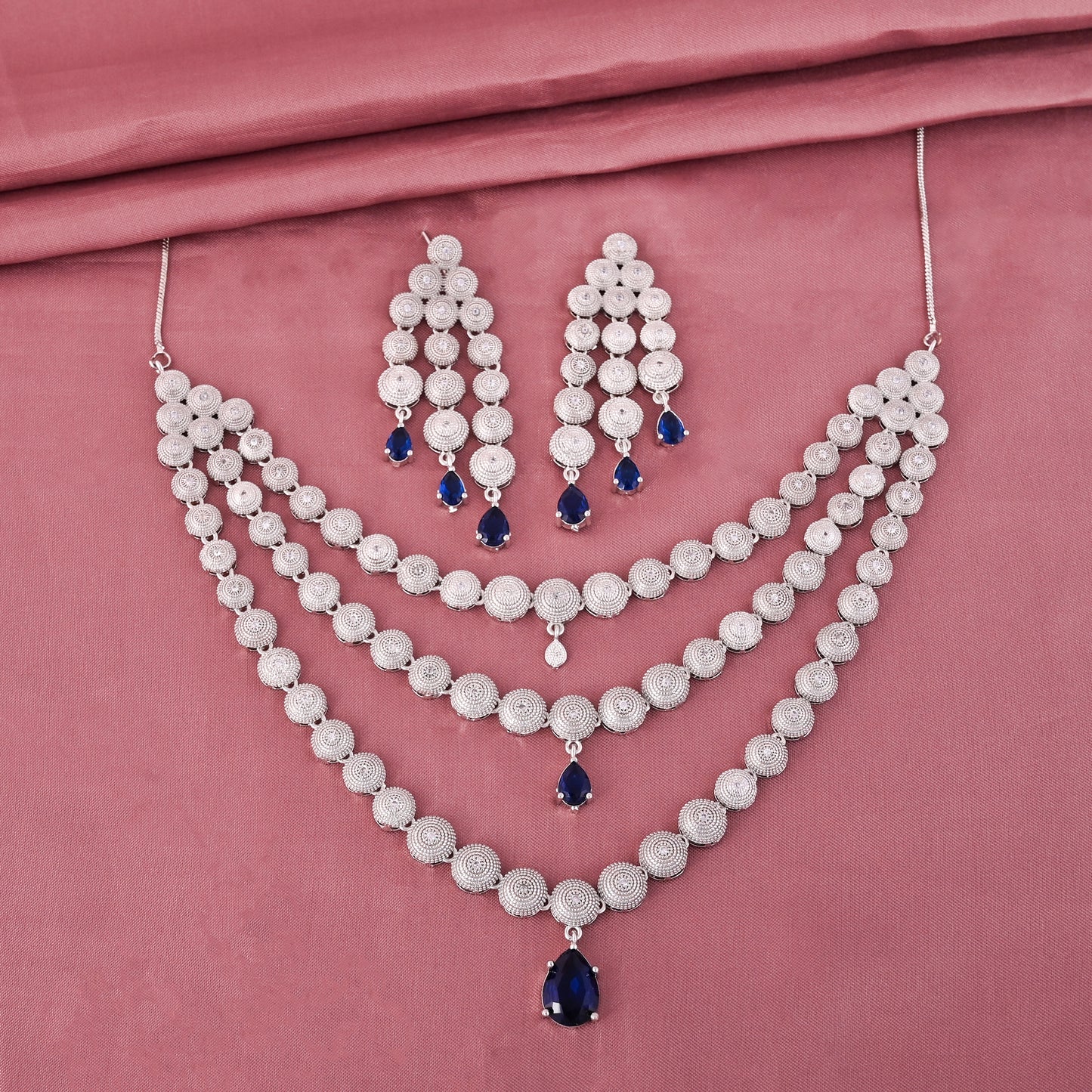 CKLAKART's NOOR Silver-Toned Triple-Layered Necklace Set Adorned with Sapphire Blue Stones and American Diamonds