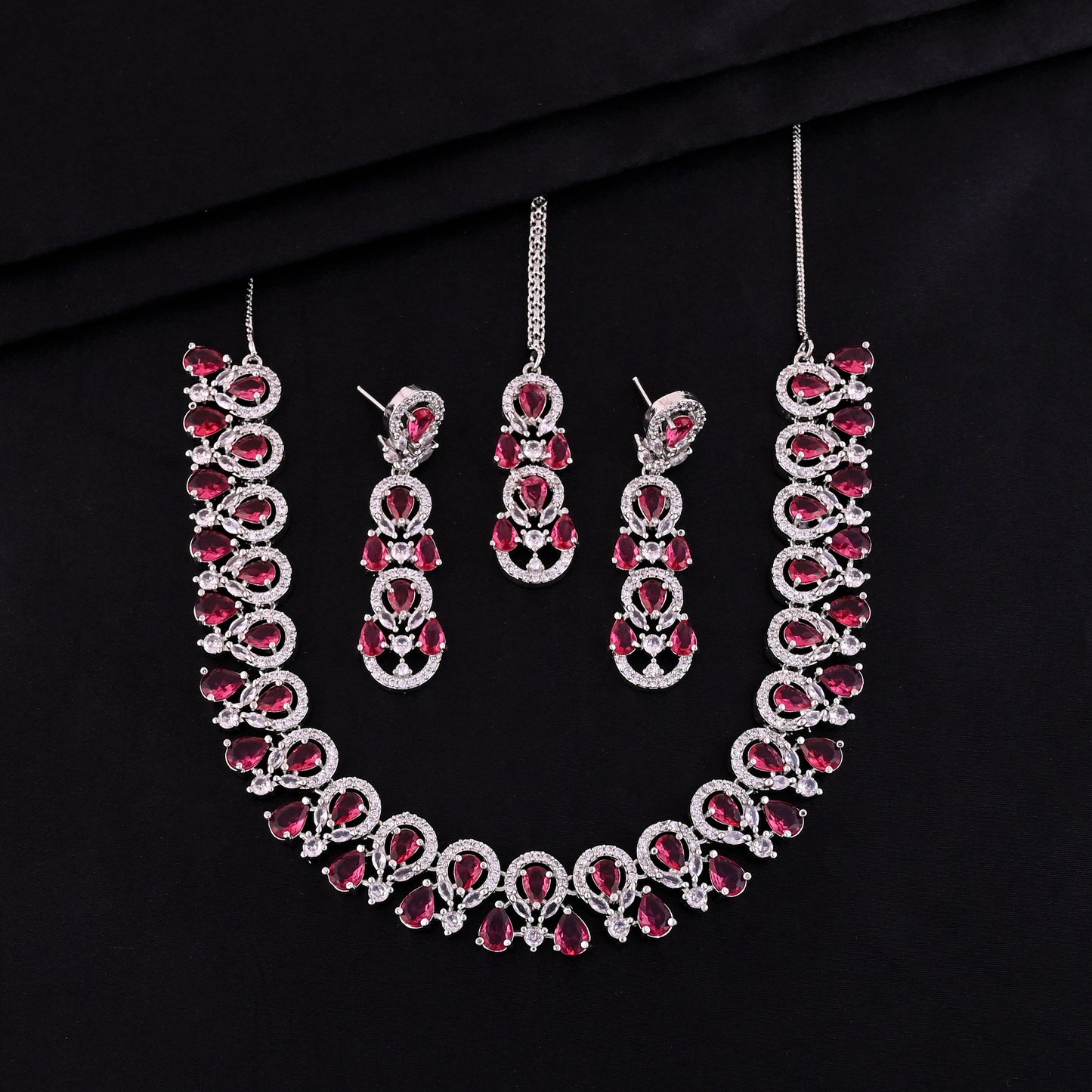 CKLAKART's NOOR Silver-Toned Ruby Color Stones Necklace Set with Maang Tika and American Diamond Accents