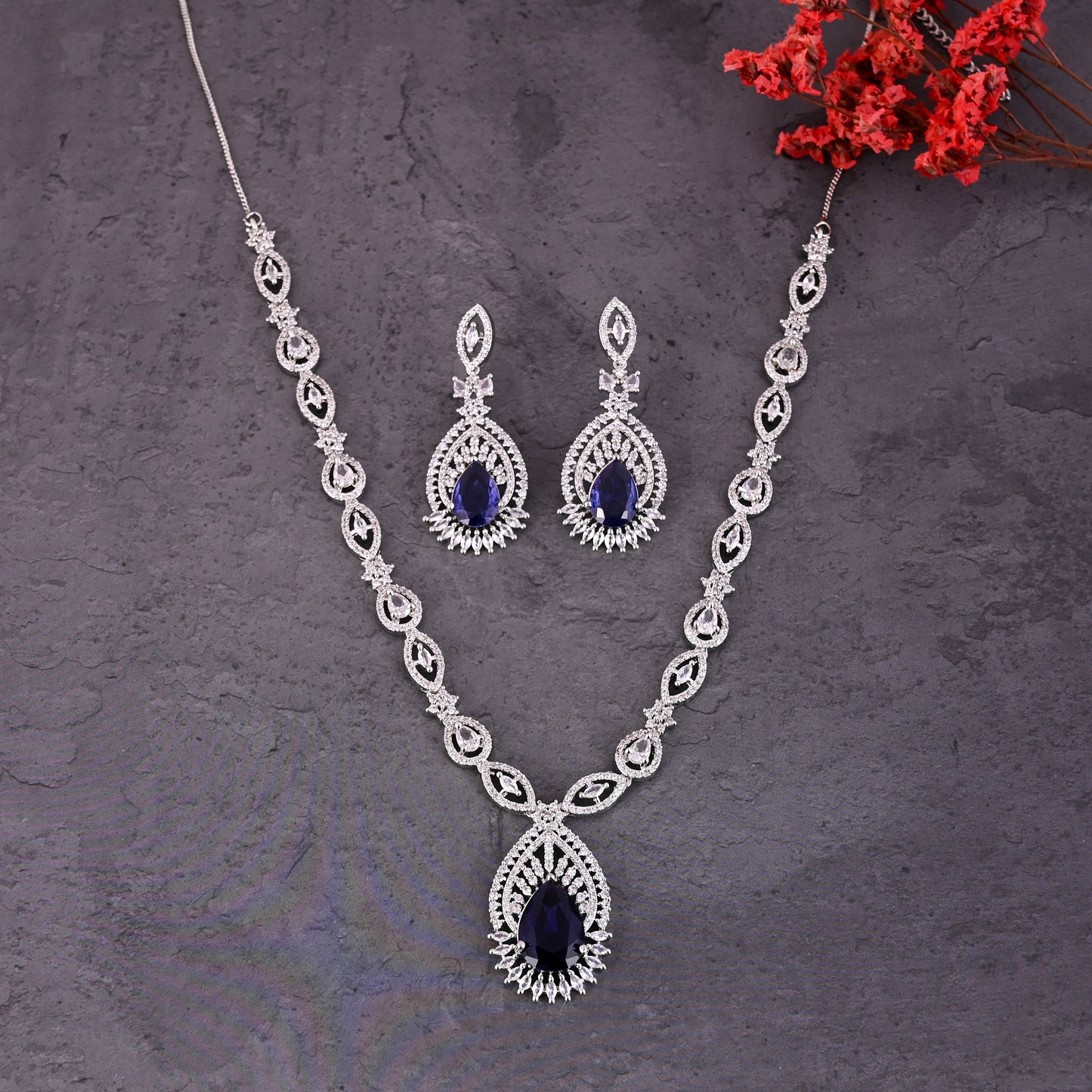 CKLAKART's NOOR Silver Necklace Set Adorned with Sapphire Blue Stones and American Diamonds