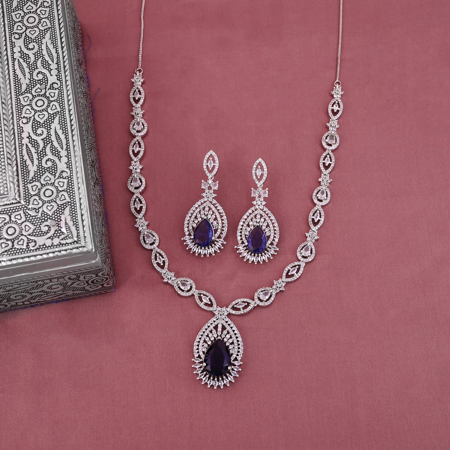 CKLAKART's NOOR Silver Necklace Set Adorned with Sapphire Blue Stones and American Diamonds