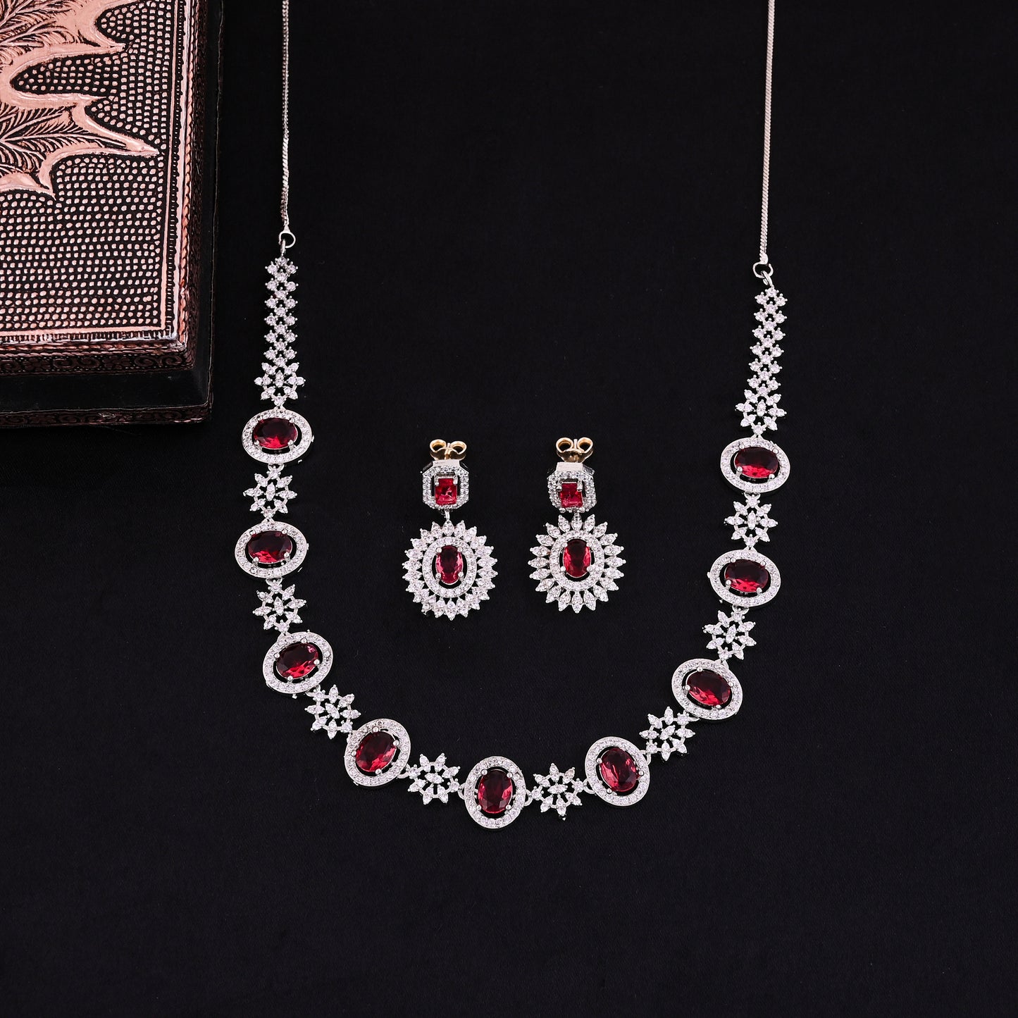 CKLAKART's NOOR Silver-Toned Necklace Set Adorned with Ruby Color Stones and American Diamonds