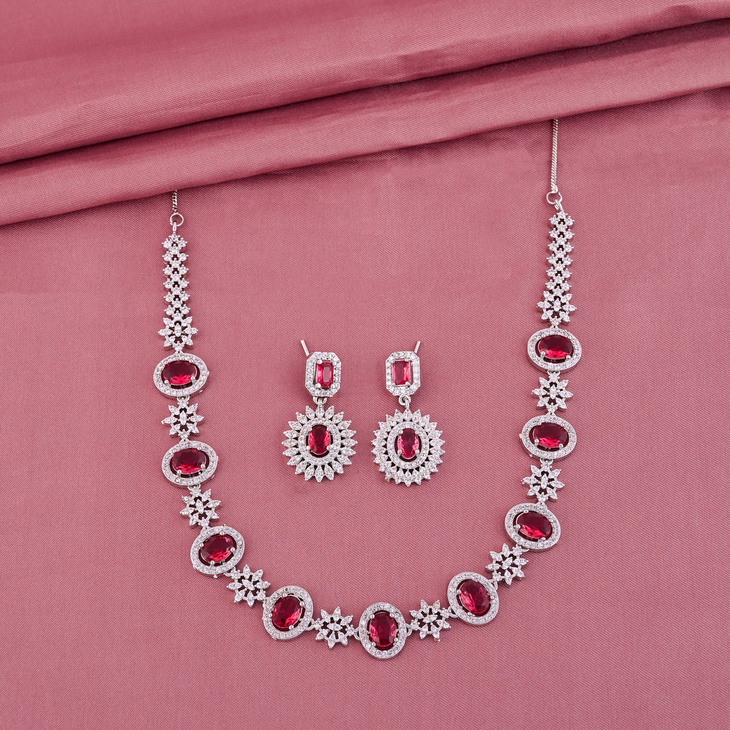 CKLAKART's NOOR Silver-Toned Necklace Set Adorned with Ruby Color Stones and American Diamonds