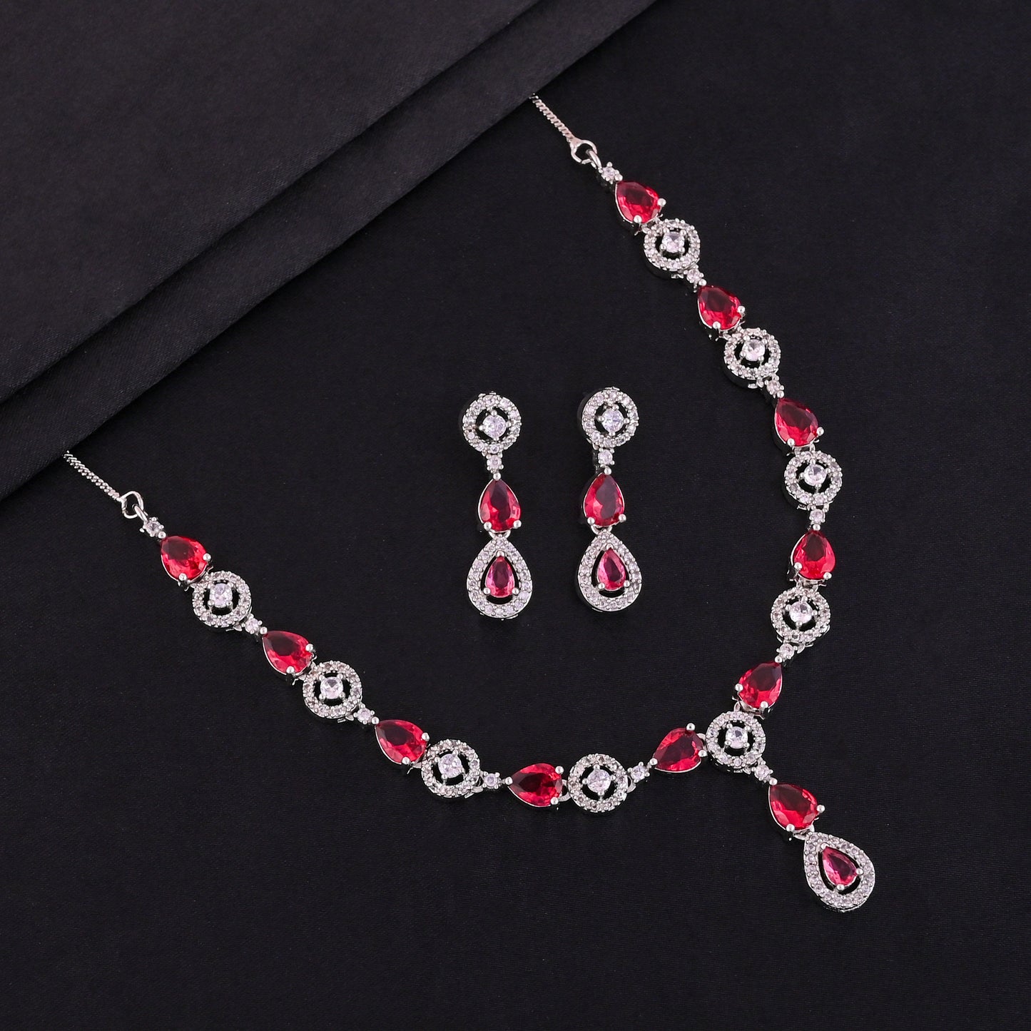 CKLAKART's NOOR Silver Necklace Set with Ruby Color Droplet Stones and Sparkling American Diamonds