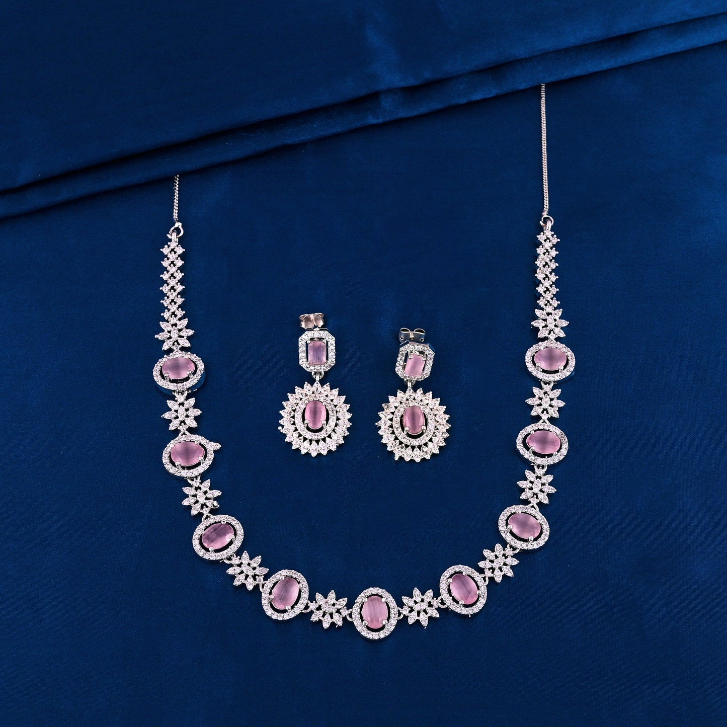 CKLAKART's NOOR Elegant Silver Necklace Set Featuring Pink Color Stones, and American Diamonds