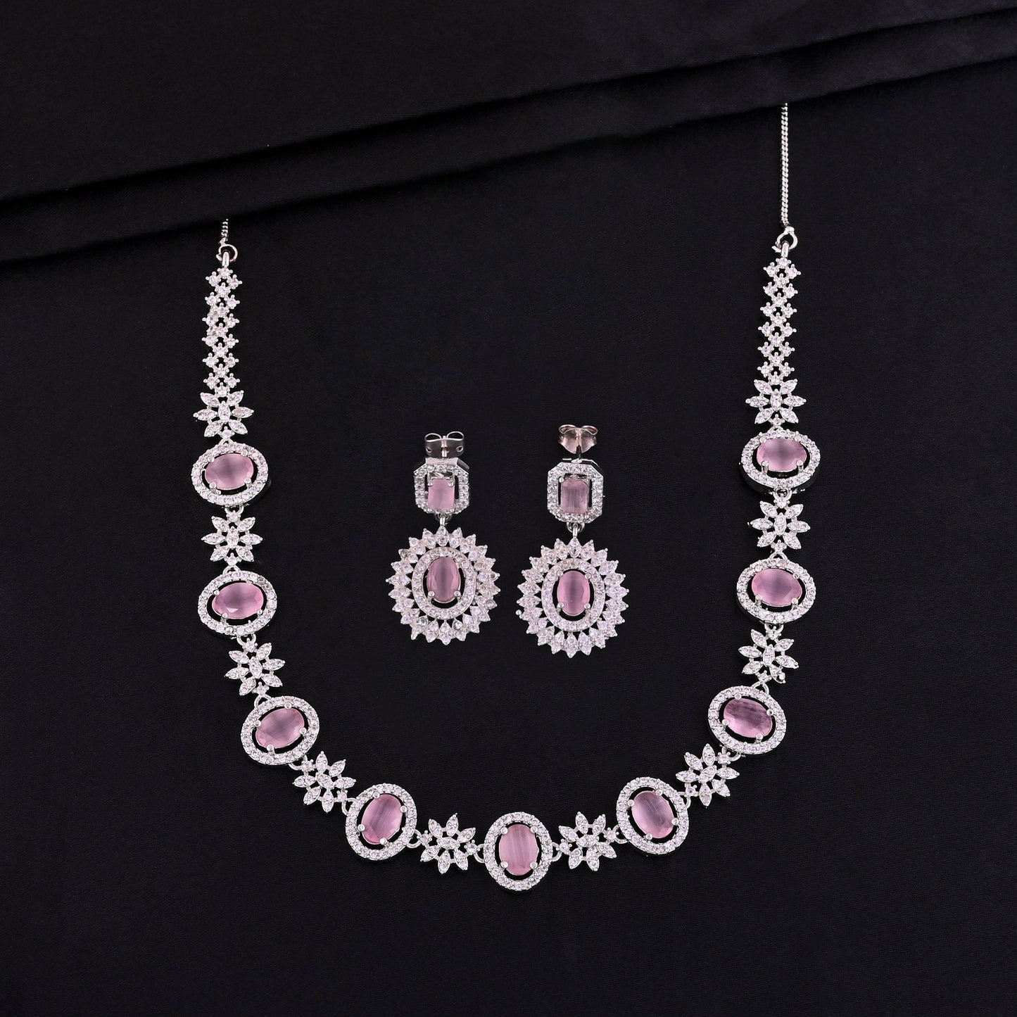 CKLAKART's NOOR Elegant Silver Necklace Set Featuring Pink Color Stones, and American Diamonds