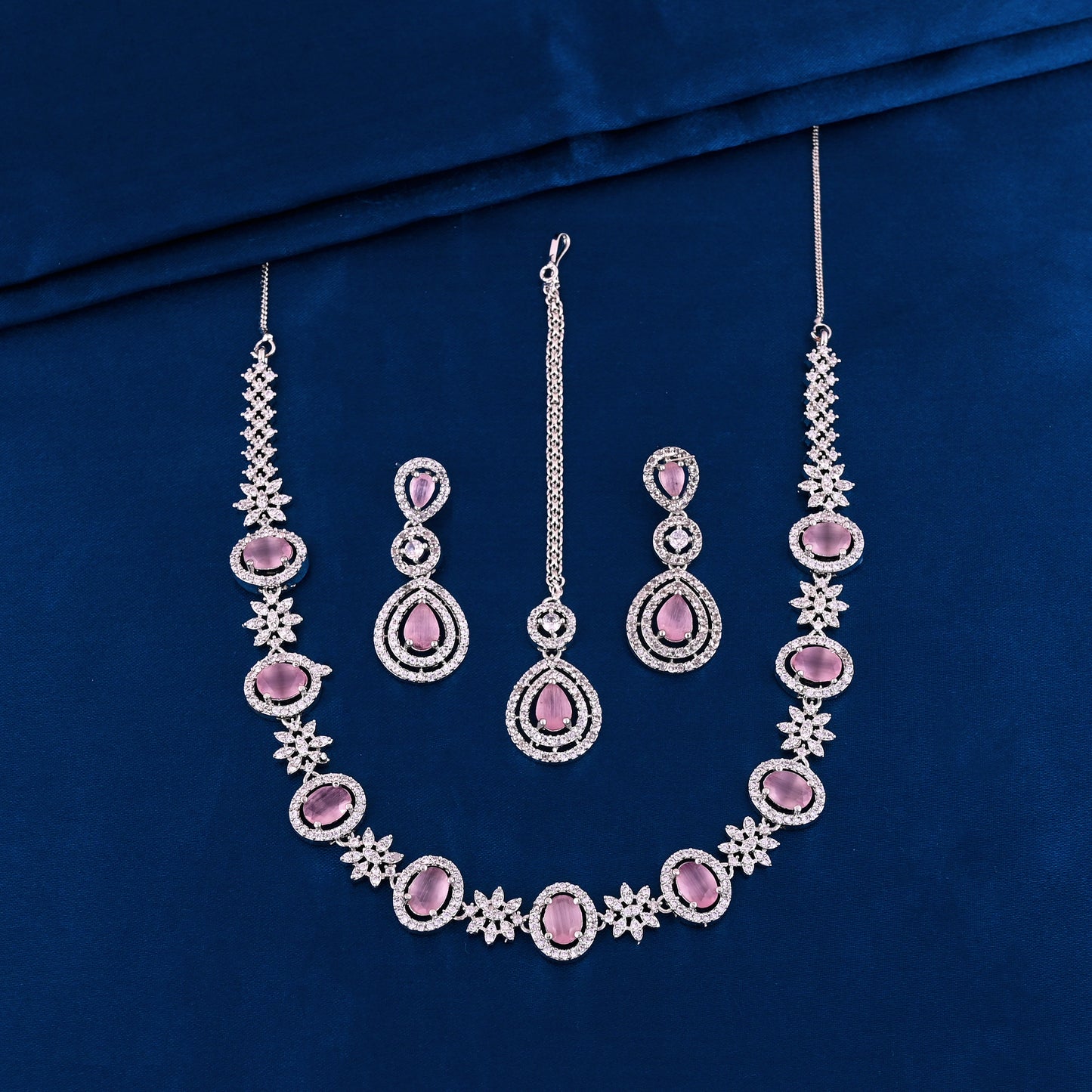 CKLAKART's NOOR Elegant Silver Necklace Set with maang tika Featuring Pink Color Stones, and American Diamonds