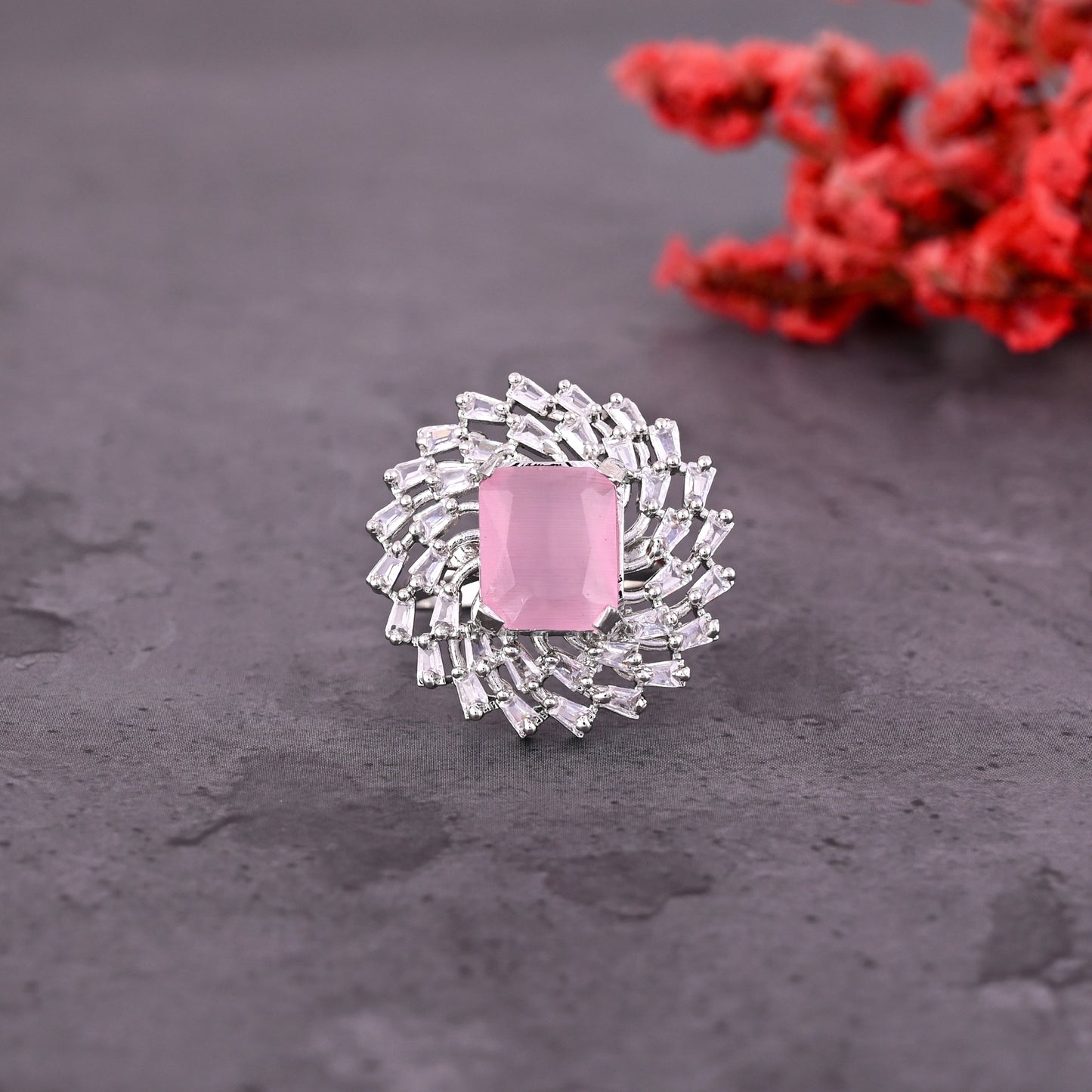 CKLAKART's NOOR Silver-Toned Ring Adorned with Rectangular Pink Color Stone and Blooming Flower Design, Enhanced with American Diamonds