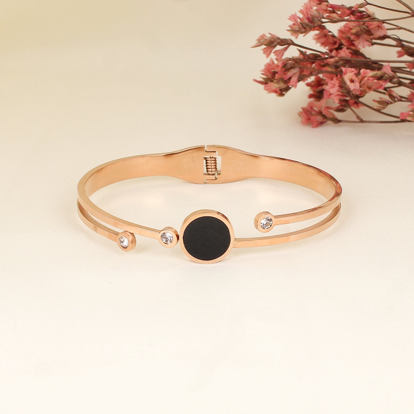 CKLAKART's Rose Gold Bracelet with Sparkling circular Stones