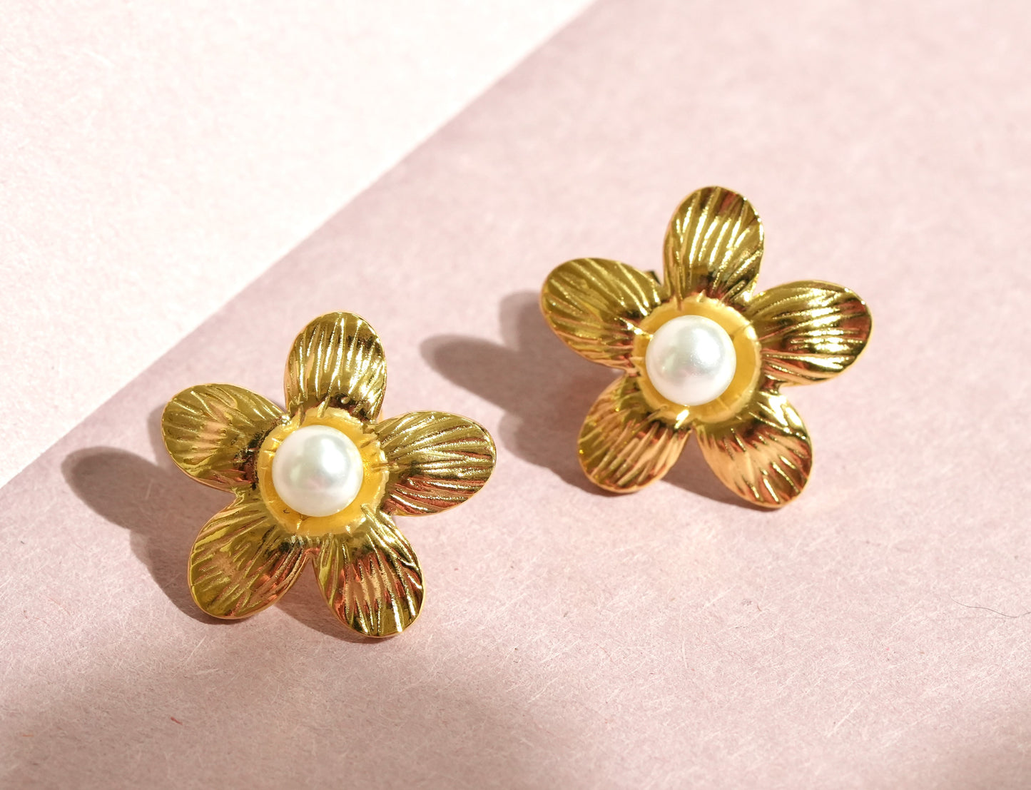 CKLAKART's Flower-Shaped Earrings with White Pearls in Gold Tone