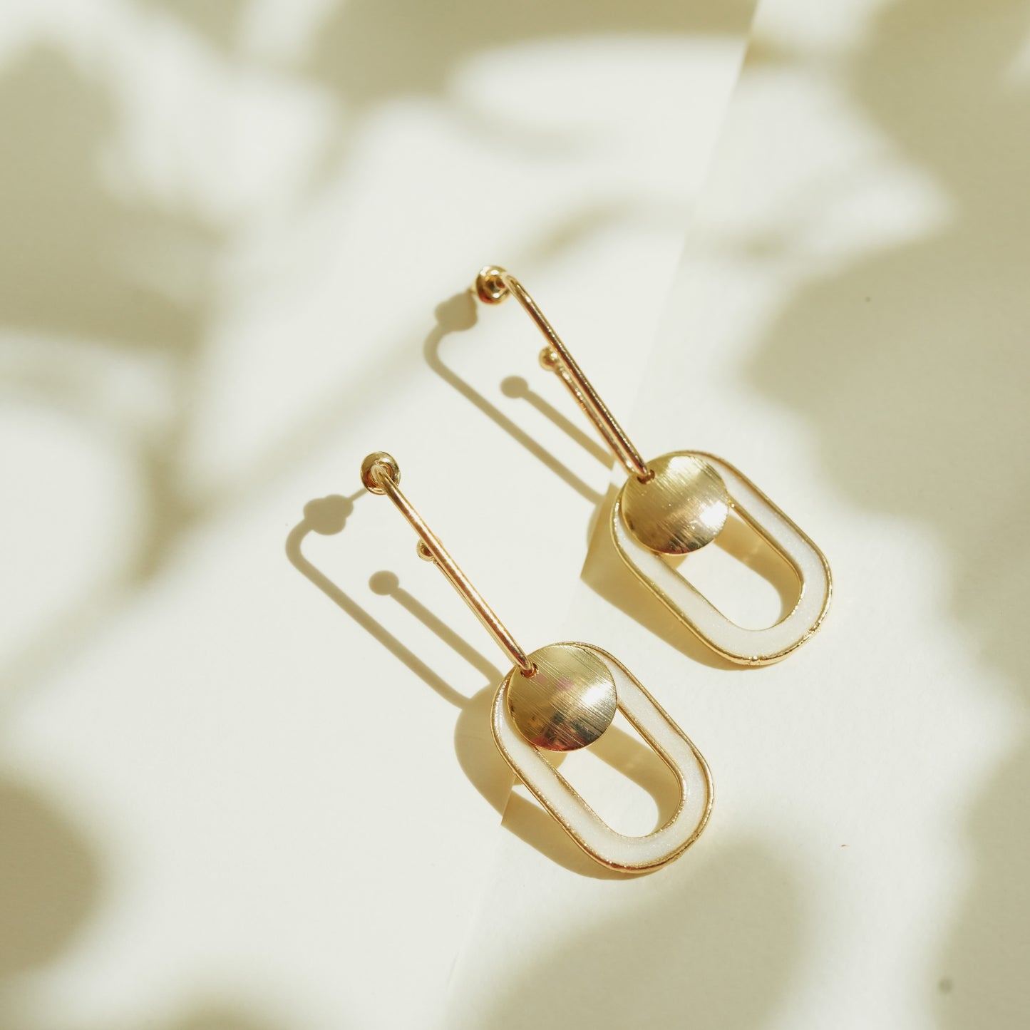 CKLAKART's Gold-Toned Geometric Hoops Earrings