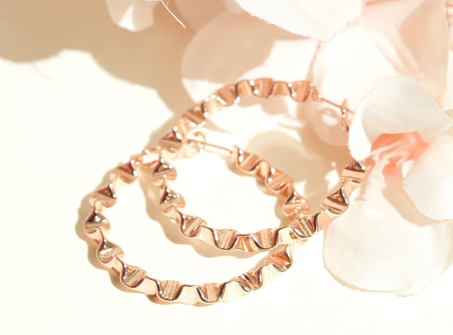 CKLAKART's Curly Chic Big Hoop Earrings in Rose Gold