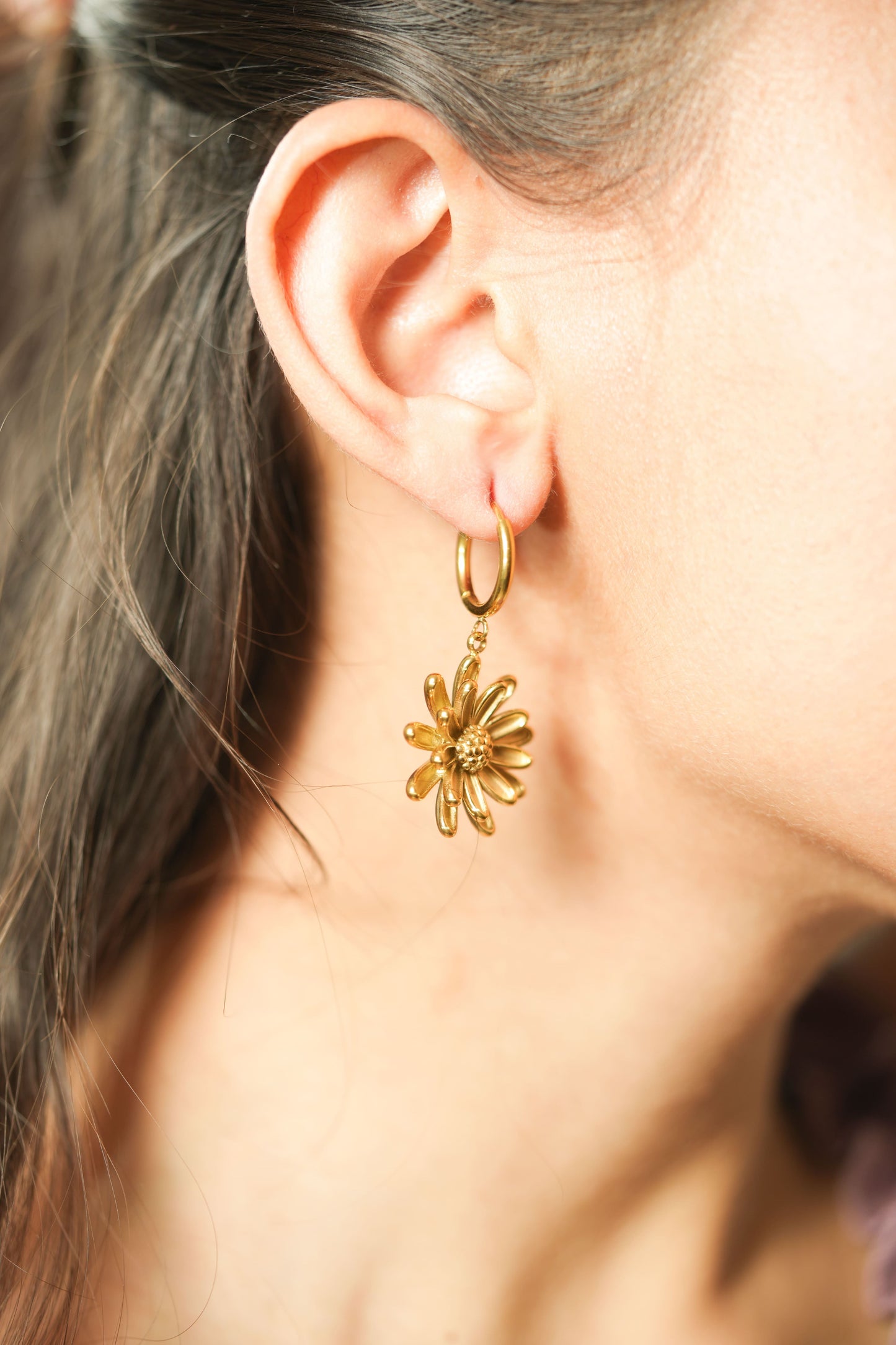 CKLAKART's Flower-Shaped Drop Earrings in Luxurious Gold Tone