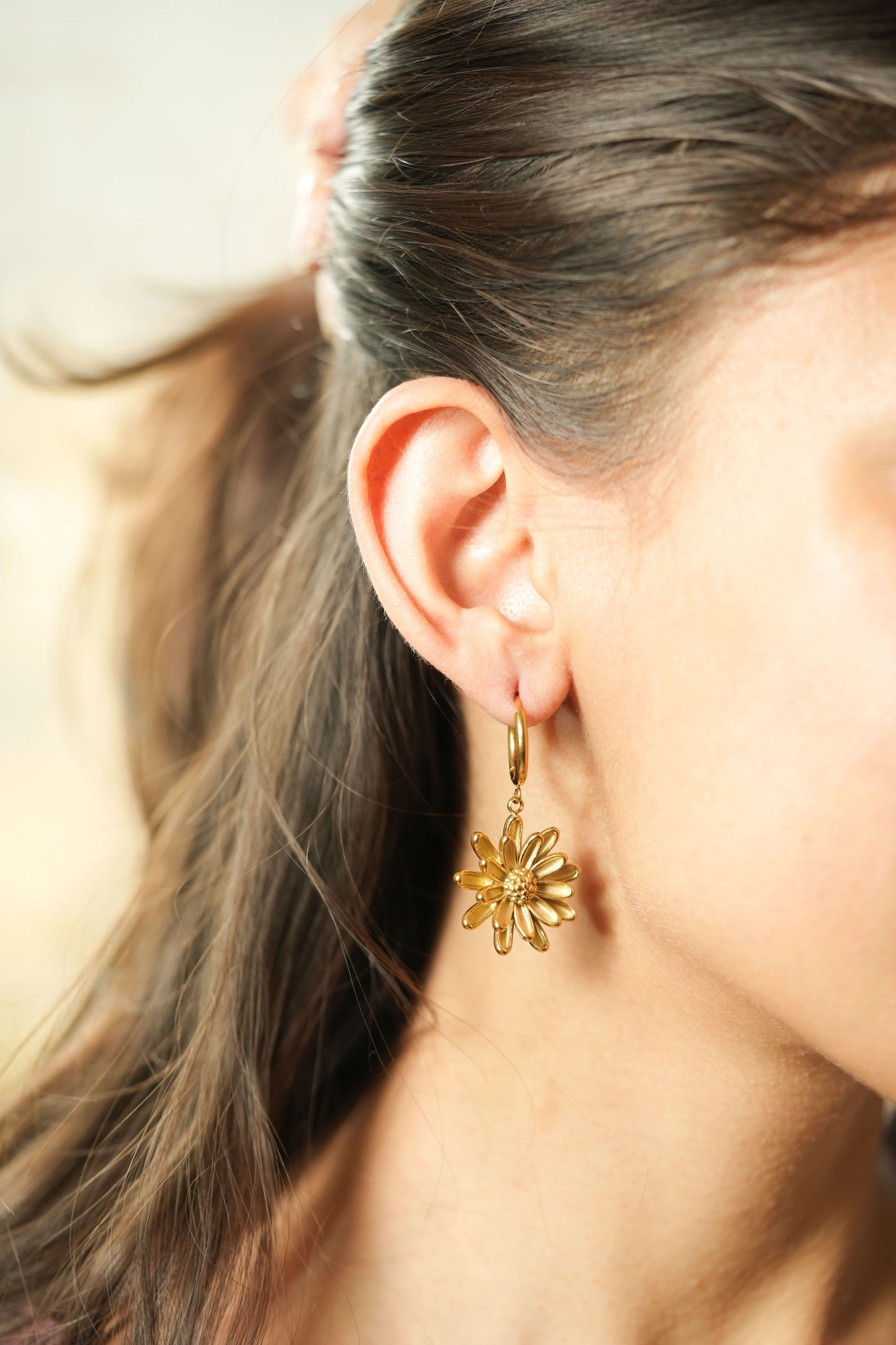 CKLAKART's Flower-Shaped Drop Earrings in Luxurious Gold Tone