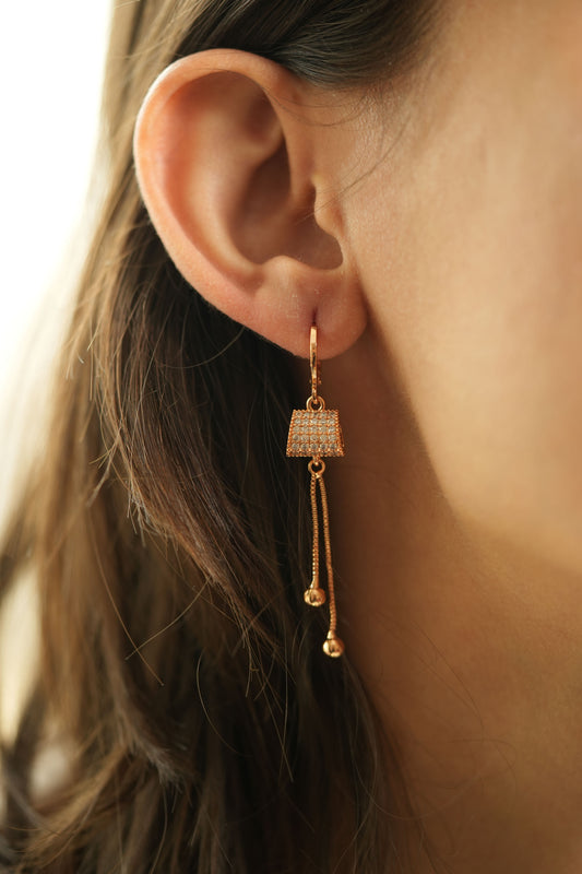 CKLAKART's Rose Gold Toned Earrings with AD Studded Clutch and Dangling Chains