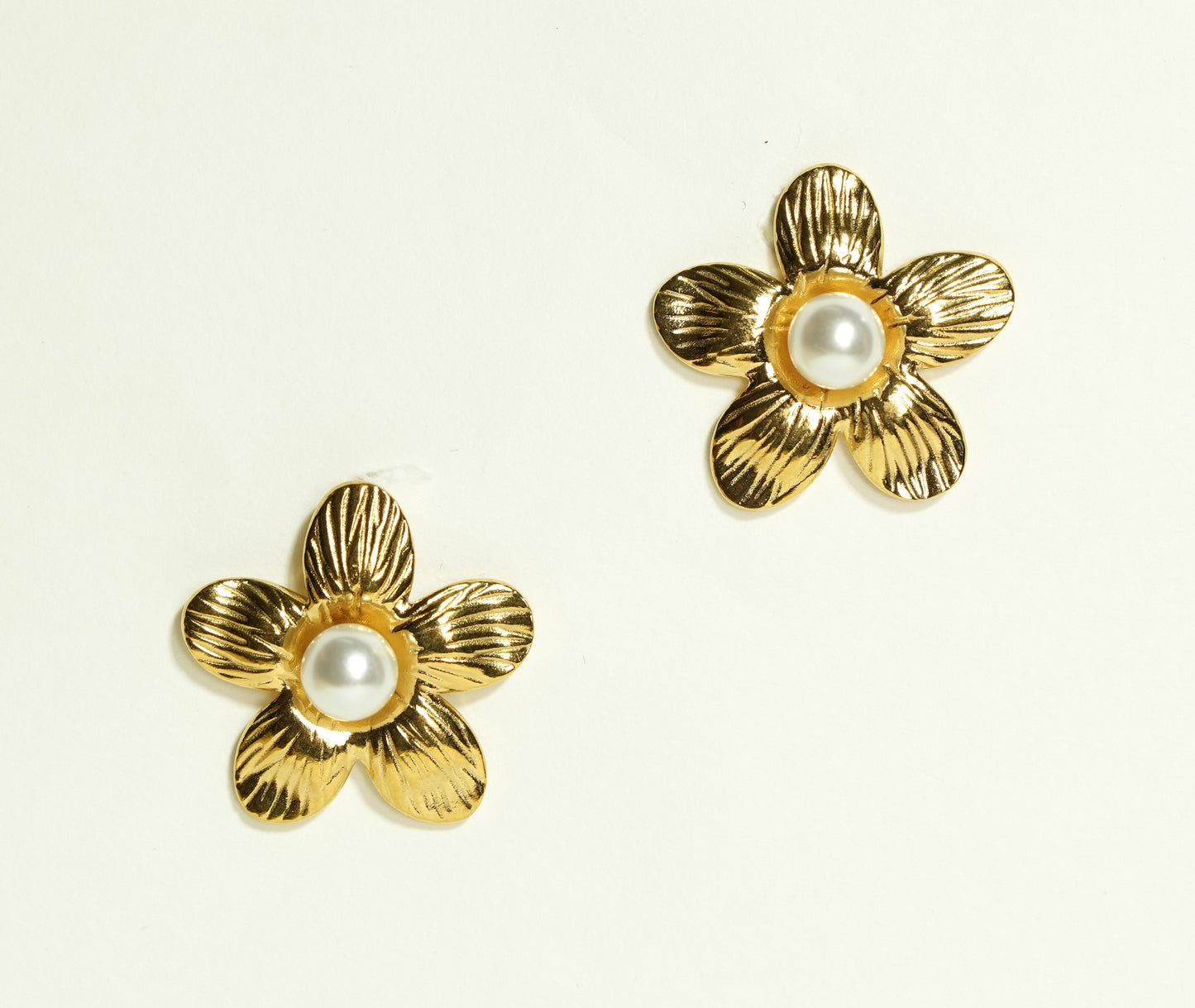 CKLAKART's Flower-Shaped Earrings with White Pearls in Gold Tone