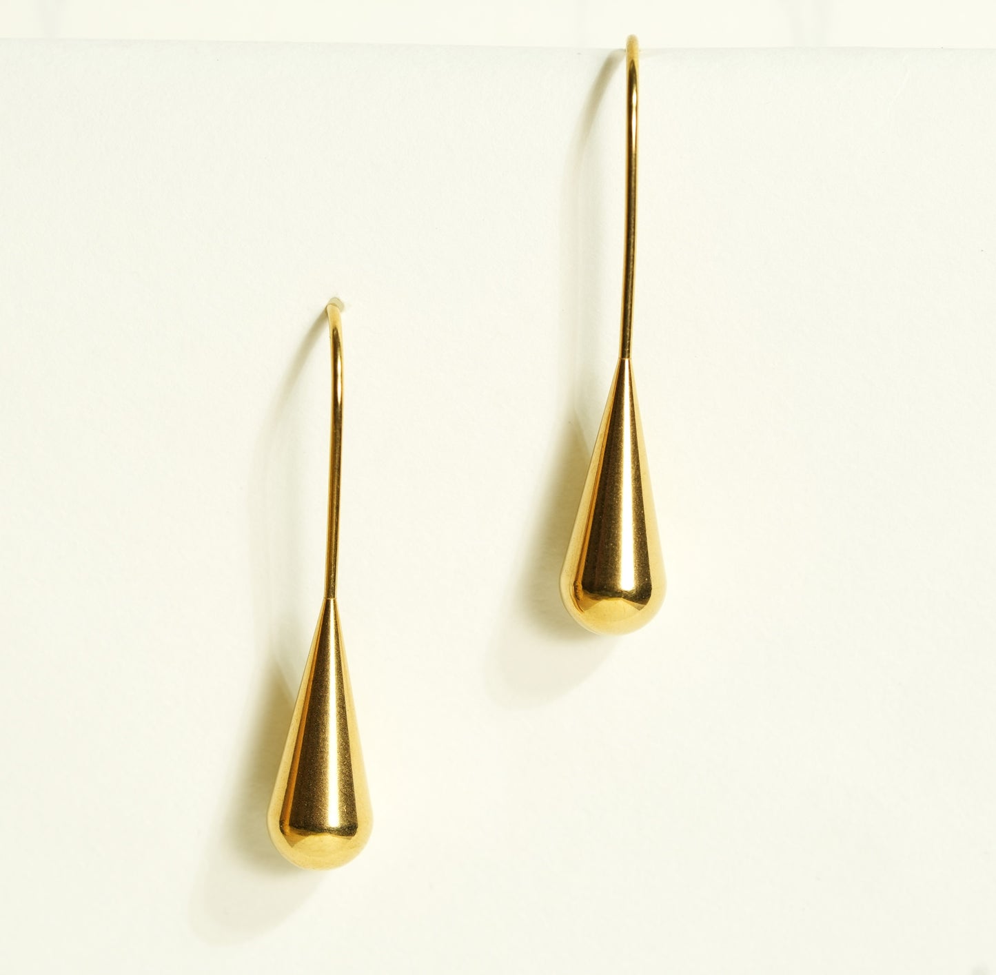 CKLAKART's Gold-Toned Drop Earrings for Contemporary Chic