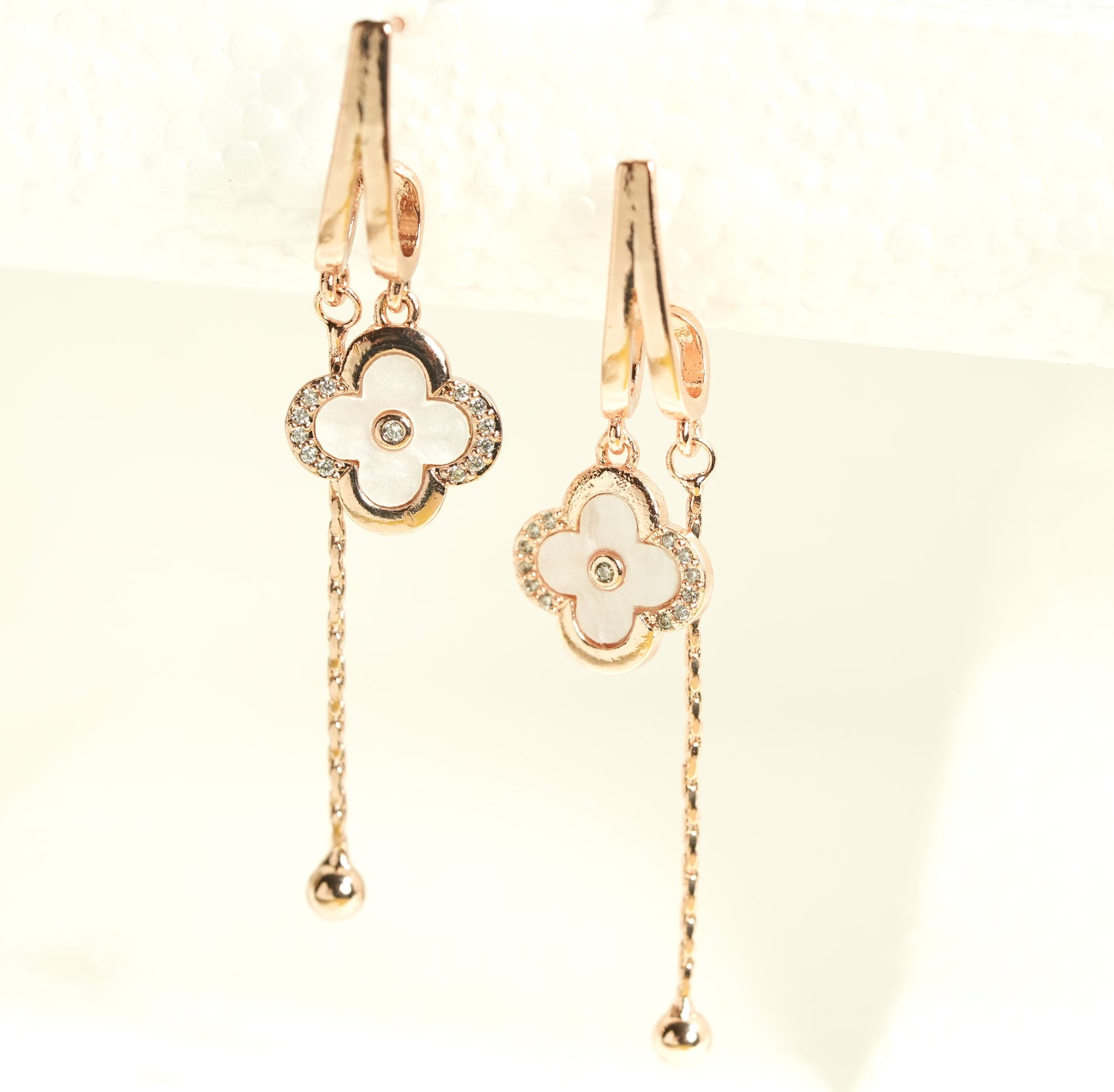 CKLAKART's Rose Gold Drop Earrings with Delicate Floral Charm